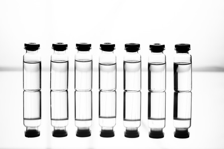 Group object of liquid medicinal agent in limpid glassware in medical laboratoryの写真素材