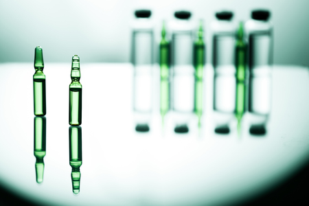 Group object of liquid medicinal agent in limpid glassware in medical laboratoryの写真素材
