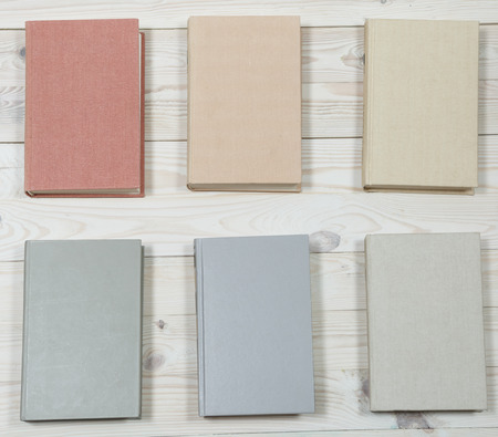 Pile of old books pastel colors stacked. Selective focus with copy spaceの写真素材