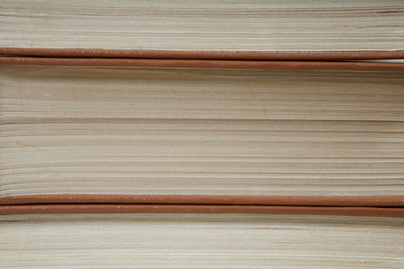 Pile of old books stacked on top of each other. Selective focus with copy spaceの写真素材