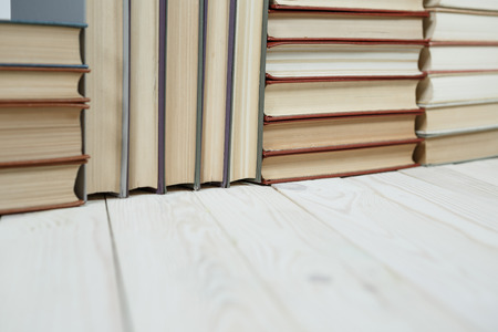Pile of old books stacked on top of each other. Selective focus with copy spaceの写真素材