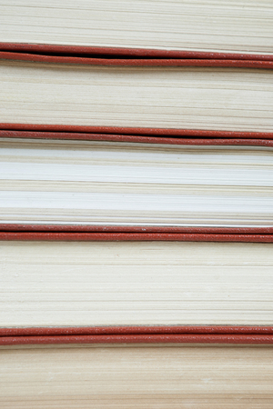 Pile of old books stacked on top of each other. Selective focus with copy spaceの写真素材