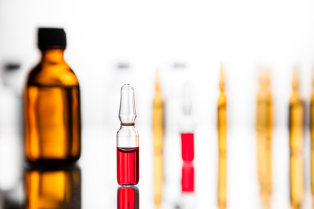 Group object of liquid medicinal agent in limpid glassware in medical laboratoryの写真素材