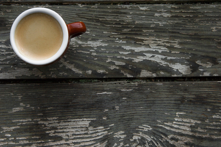 Cup of hot coffee on the wooden table. Energy drink for the whole day.. With copy spaceの写真素材