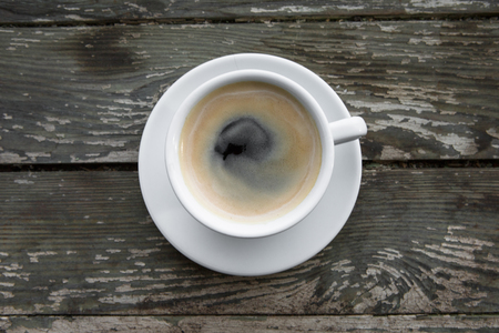 Cup of hot coffee on the wooden table. Energy drink for the whole day.. With copy spaceの写真素材