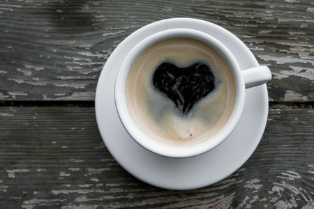 Cup of hot coffee on the wooden table. Energy drink for the whole day.. With copy spaceの写真素材