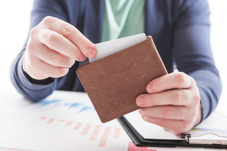 Men in suit with wallet and credit card.の写真素材