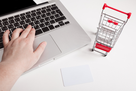 Business woman hands using laptop, and holding credit card as Online shopping concept.の写真素材