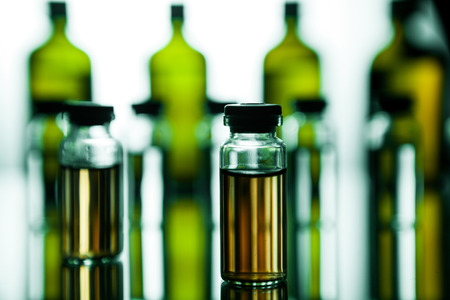 Group object of liquid medicinal agent in limpid glassware in medical laboratory. Group of ampoules with a transparent medicine in medical laboratoryの写真素材