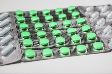 Medicine pills in packs pills in blister pack capsules and pill packed in blistersの写真素材