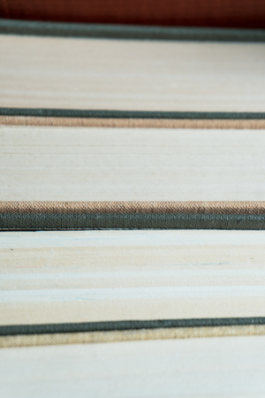 Many books in a bookstore or library on wooden background with copy spaceの写真素材