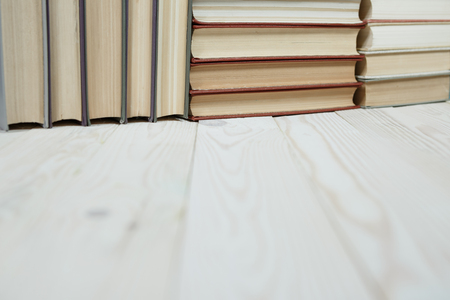 Pile of old books stacked on top of each other. Selective focus with copy spaceの写真素材