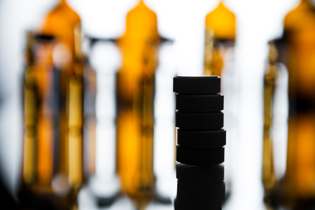 Group object of liquid medicinal agent in limpid glassware in medical laboratory. Group of ampoules with a transparent medicine in medical laboratoryの写真素材
