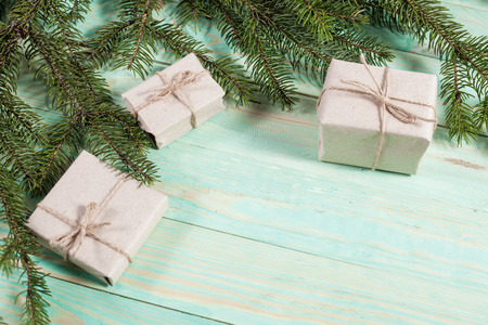 Gift boxes wrapped kraft paper tied with twine and paper snowflake and tied with twine. with copy spaceの写真素材