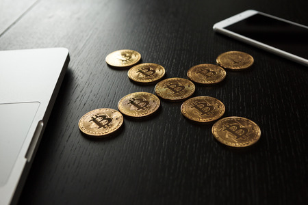 Bitcoin coin symbol on laptop future concept financial currency crypto currency sign. With copy spaceの写真素材