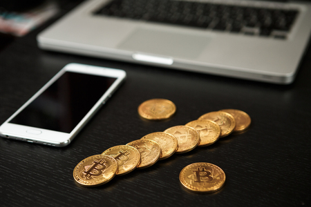 Bitcoin coin symbol on laptop future concept financial currency crypto currency sign. With copy spaceの写真素材