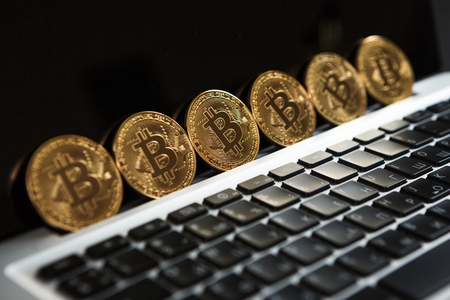 Bitcoin coin symbol on laptop future concept financial currency crypto currency sign. With copy spaceの写真素材