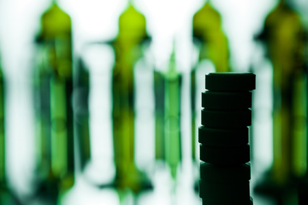 Group object of liquid medicinal agent in limpid glassware in medical laboratory. Group of ampoules with a transparent medicine in medical laboratoryの写真素材