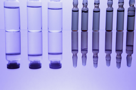 Medication drug needle syringe drug,medical Vaccine vial hypodermic injection treatment disease care in hospital and prevention illness.selective focus.の写真素材