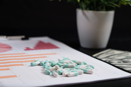 Medical marketing and Health care business analysis report. Pile of pills in blister packs...