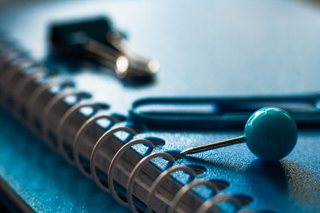 School office supplies on blue background. Banner for site. selective focus