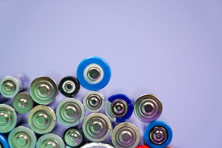 Ecology recycling concept. Many different types used or new battery, rechargeable accumulator,...