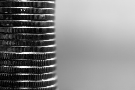 Stack of coins black and white macro. Ukrainian coins , Concept of saving moneyの写真素材