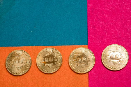 Golden bitcoins and smartphone. Bitcoin cryptocurrency. Miner with dollars from trading. Digital currency. Profit from mining cryptocurrencies.の写真素材