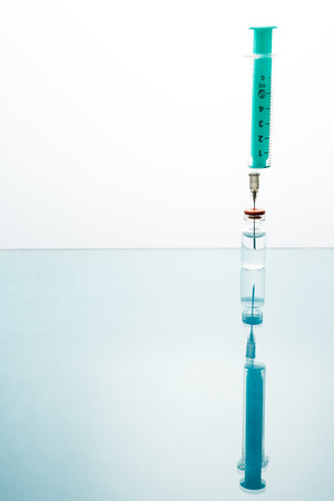 Medication drug needle syringe drug,medical Vaccine vial hypodermic injection treatment disease care in hospital and prevention illness.selective focus.の写真素材