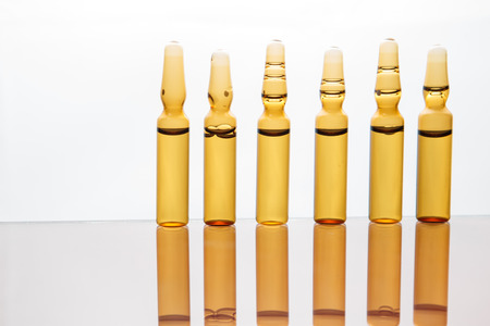 Medication drug needle syringe drug,medical Vaccine vial hypodermic injection treatment disease care in hospital and prevention illness.selective focus.の写真素材