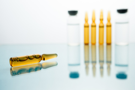 Medication drug needle syringe drug,medical Vaccine vial hypodermic injection treatment disease care in hospital and prevention illness.selective focus.の写真素材