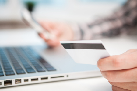 Close Up of businessman hands using laptop computer with blank copy space screen for your advertising text message or content businessの写真素材