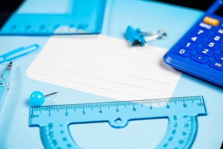 Back to school of education season background or business office desk concept. Flat lay essential objects for learning or working on wooden plank.の写真素材