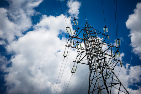 Electricity is the major energy of the world. High voltage post. High voltage tower sky background. Aerial industrial background group of transmission towers.の写真素材