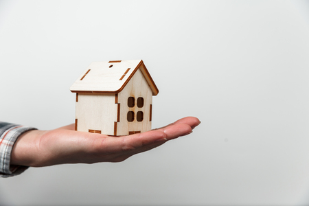 Real estate concept. Buying and selling homes. Mortgage and payment of taxes. Debt and loan. Purchase. Home sold. Real Estate Agent Services. Rent apartment. Sale of property.の写真素材