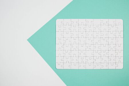 Hands assembling jigsaw puzzle, to find common solution conceptの写真素材