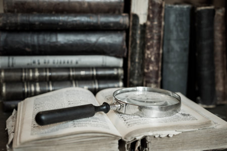 Books shelf with old open book. Old leather bound vintage books