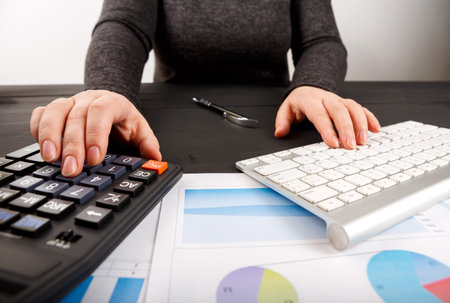 Close up of man accountant or banker making calculations. Close up of man accountant or banker...