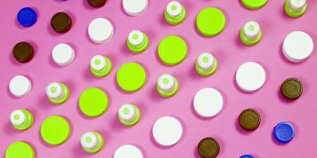Ecology recycling concept. Many different types used or new battery, rechargeable accumulator, alkaline batteries on color background. Nature energyの写真素材