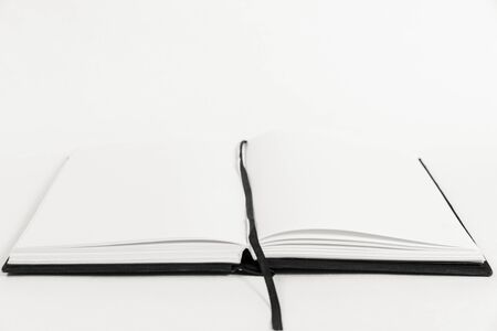An open book on a table. Copy spaceの写真素材