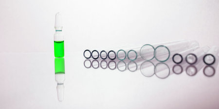 Group of vials with medication on blue methacrylate table. Horizontal composition.