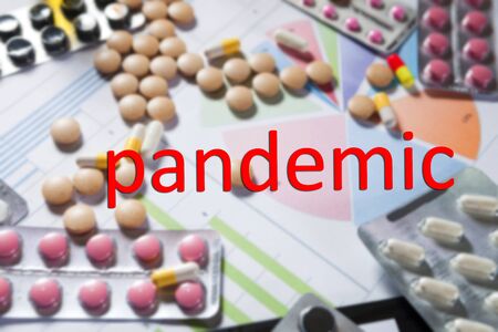 Medical marketing and Health care business analysis report. Pile of pills in blister packs backgroundの写真素材