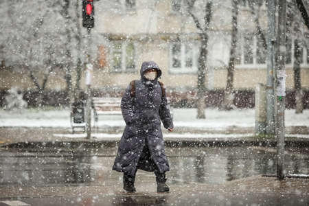KYIV, UKRAINE - MARCH 22: A woman on the street during a coronavirus outbreak March 22, 2020 in Kyiv, Ukraine.のeditorial素材