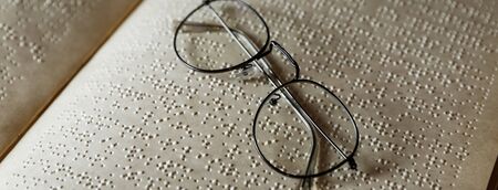 close up view braille text on old bookの写真素材