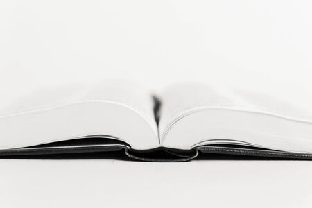 An open book on a table. Copy spaceの写真素材