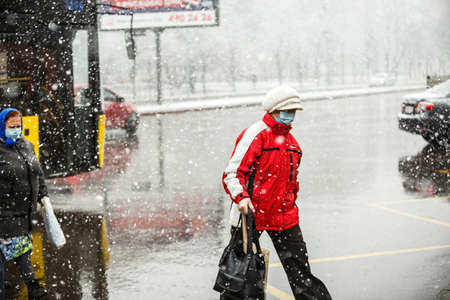 KYIV, UKRAINE - MARCH 22: A woman on the street during a coronavirus outbreak March 22, 2020 in Kyiv, Ukraine.のeditorial素材