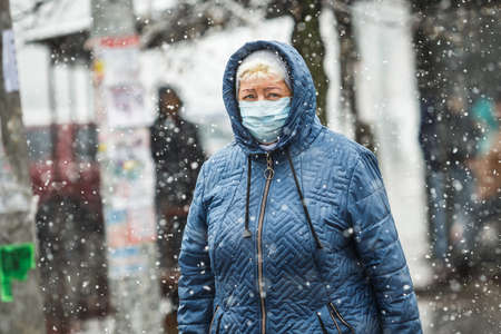 KYIV, UKRAINE - MARCH 22: A woman on the street during a coronavirus outbreak March 22, 2020 in Kyiv, Ukraine.のeditorial素材