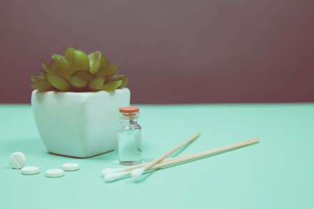 White pill on a wooden background with copy space. Global healthcare concept. Pharmaceutical industry. Pharmacy.の写真素材