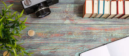 Office supplies in the wooden workspace. Top view with copy space for input the text. Designer workspace on desk table essential elements on flat layの写真素材