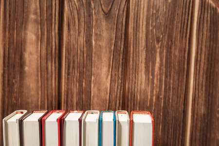 Office supplies in the wooden workspace. Top view with copy space for input the text. Designer workspace on desk table essential elements on flat layの写真素材